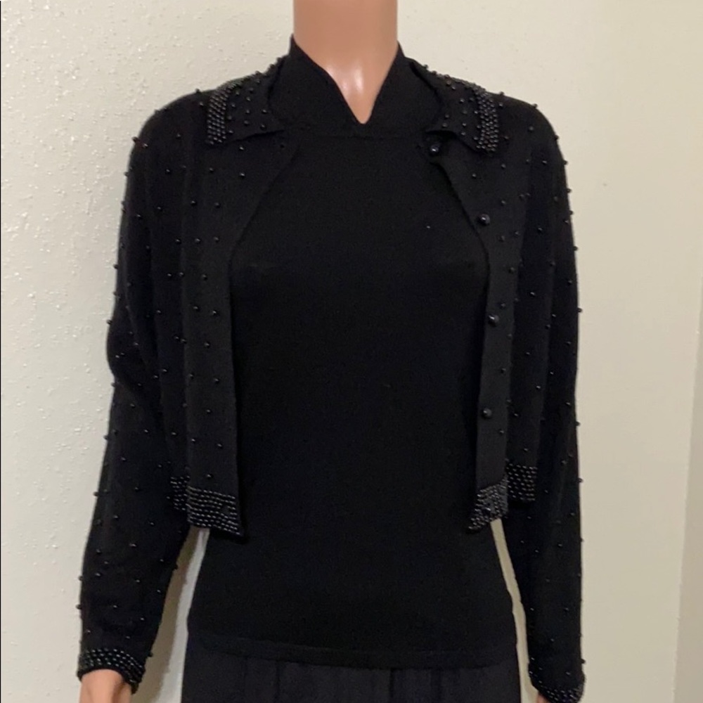 Black short cardigan by Ann Wi